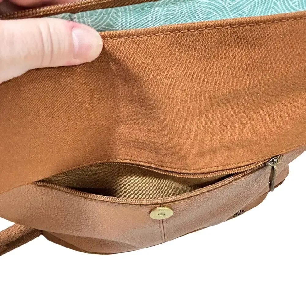 The Sak caramel brown leather messenger bag studded backpack Boho casual purse